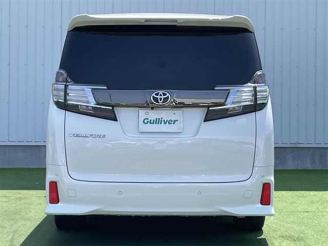 トヨタ ヴェルファイア Z Aエディション ゴールデンアイズ 香川県 2017(平29)年 5.9万km ホワイトパールクリスタルシャイン 登録時走行距離：58540km/ディーラー純正10型ナビ　/バックカメラ/純正12.1型フリップダウンモニター　/両側パワースライドドア/パワーバックドア　/デジタルインナーミラー/ドライブレコーダー/ＥＴＣ　/クルーズコントロール/コーナーセンサー　/レーンキープアシスト/ＬＥＤヘッドライト/オートライト/ハーフレザーシート/オットマン