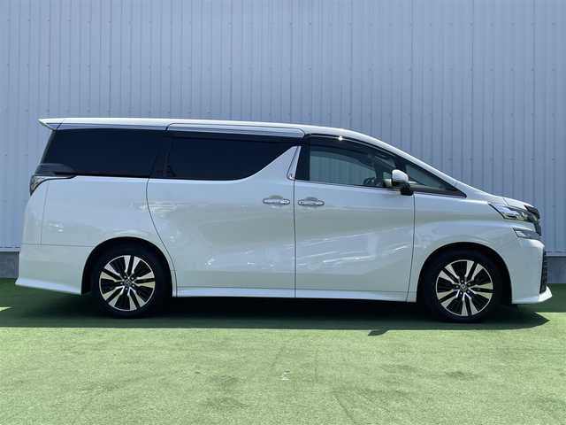 トヨタ ヴェルファイア Z Aエディション ゴールデンアイズ 香川県 2017(平29)年 5.9万km ホワイトパールクリスタルシャイン 登録時走行距離：58540km/ディーラー純正10型ナビ　/バックカメラ/純正12.1型フリップダウンモニター　/両側パワースライドドア/パワーバックドア　/デジタルインナーミラー/ドライブレコーダー/ＥＴＣ　/クルーズコントロール/コーナーセンサー　/レーンキープアシスト/ＬＥＤヘッドライト/オートライト/ハーフレザーシート/オットマン