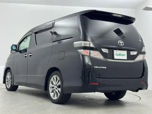トヨタ ヴェルファイア 2．4Z プラチナセレⅡ ゴールド 愛知県 2011(平23)年 13.1万km ブラック ２．４Ｚ　プラチナセレクションII　タイプゴールド/両側パワースライドドア/電動リアゲート/三列シート/ウォークスルー/clarion　7インチナビ/（CD/DVD/BT/フルセグ）/バックカメラ/ETC/横滑り防止/前後コーナーセンサー/HIDヘッドライト/ステアリングスイッチ/MTモード/フォグランプ/ドアバイザー/純正AW