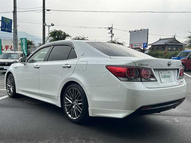 トヨタ クラウン ハイブリッド アスリートS J－フロンティア 愛媛県 2017(平29)年 8.3万km ホワイトパールクリスタルシャイン 純正ナビ(フルセグTV/DVD/Blu-ray/Bluetooth)/レーダークルーズコントロール/バックカメラ/ETC/シートヒーター/ステアリングヒーター/パワーシート/ハーフレザーシート/前後コーナーセンサー/純正アルミホイール/純正ドアバイザー/フロアマット/LEDヘッドライト/フォグランプ/オートライト/レーンキープアシスト/横滑り防止装置/盗難防止装置/衝突軽減装置/カーテンエアバッグ/ABS