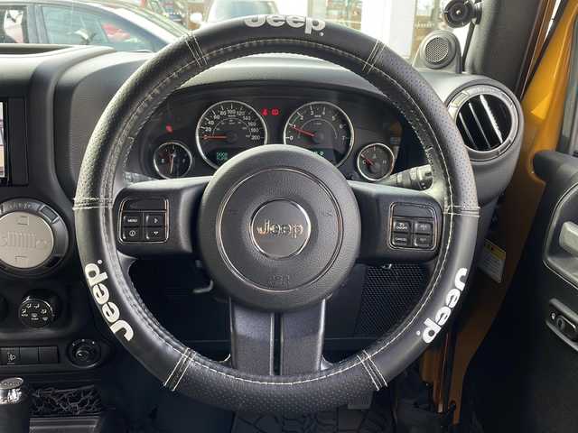 クライスラー・ジープ ジープ ラングラー アンリミテッド スポーツ 福岡県 2013(平25)年 6.9万km オレンジ 社外ナビ【カロッツェリア】/　Ｂｌｕｅｔｏｏｔｈ・フルセグＴＶ・ＣＤ・ＤＶＤ　/クルーズコントロール　/デジタルインナーミラー　/後席モニター/ヒーテッドドアミラー　/バックカメラ　/ＭＴモード付ＡＴ車　/ルーフキャリア/トランスファーレバー/スペアキー１本/リモコンキー/純正フロアマット/ダウンヒルアシストコントロール/パワーウィンドウ/横滑り防止装置/取扱説明書