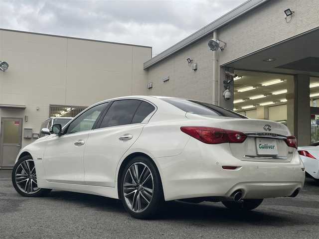日産 スカイライン ハイブリッド 350GT タイプSP 60thLTD 和歌山県 2017(平29)年 3.3万km ブリリアントホワイトパール 純正ナビ/（AM/FM/CD/DVD/USB/AUX/Bluetooth/TV）/アラウンドビュー＆リアモニター/クリアランスソナー/サイドカメラ/クルーズコントロール（追従有）/D/Nシートヒーター/D/Nパワーシート/パドルシフト/前後ドライブレコーダー/オートライト/プッシュスタート/オートライト/純正ホイール/保証書