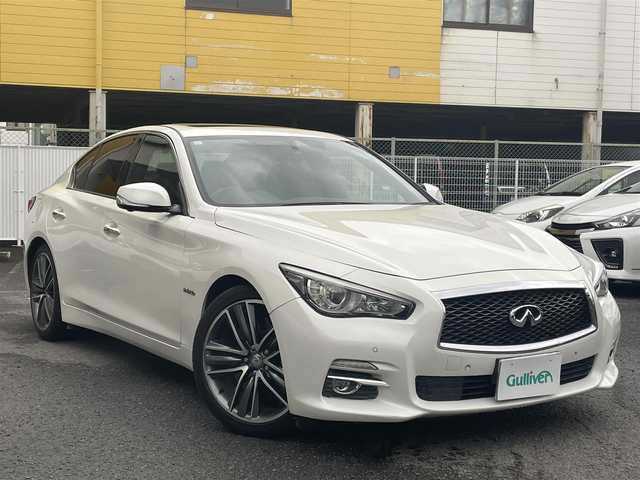 日産 スカイライン ハイブリッド 350GT タイプSP 60thLTD 和歌山県 2017(平29)年 3.3万km ブリリアントホワイトパール 純正ナビ/（AM/FM/CD/DVD/USB/AUX/Bluetooth/TV）/アラウンドビュー＆リアモニター/クリアランスソナー/サイドカメラ/クルーズコントロール（追従有）/D/Nシートヒーター/D/Nパワーシート/パドルシフト/前後ドライブレコーダー/オートライト/プッシュスタート/オートライト/純正ホイール/保証書