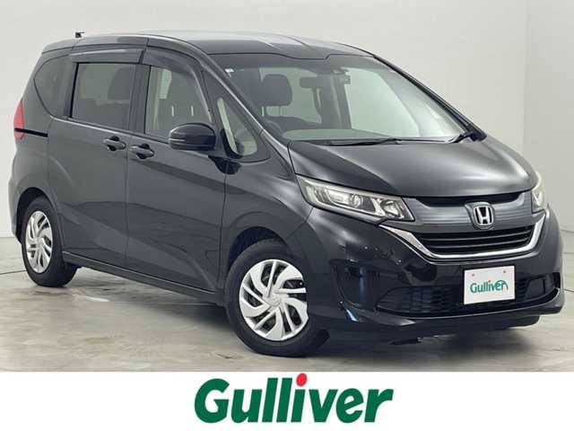 ホンダ フリード G ホンダセンシング 福岡県 2018(平30)年 6.5万km プレミアムスパークルブラックパール 社外ナビ（フルセグＴＶ）　/バックカメラ　/ビルトインＥＴＣ　/前方ドラレコ　/アダプティブクルコン　/ホンダセンシング　/衝突被害軽減ブレーキ　/レーンキープ　/先行車発進お知らせ　/標識認識機能　/両側電動スライドドア　/ＬＥＤヘッドライト