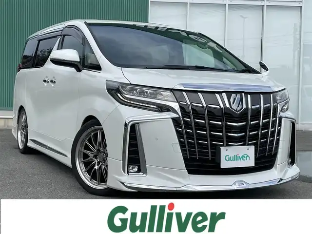 トヨタ アルファード S Cパッケージ 福岡県 2022(令4)年 1.6万km ホワイトパールクリスタルシャイン ワンオーナー/フリップダウンモニター/ツインムーンルーフ/モデリスタエアロ（F/S/R)/純正ナビ（BT/フルセグ/AM/FM/DISC/USB)/Bカメラ/パワーバックドア/オットマン/両側パワースライドドア/レーダークルーズコントロール/LEDヘッドライト/オートライト/オートマチックハイビーム/シーケンシャルターンランプ/レザーシート/シートメモリー/DN席パワーシート/DN席エアシート/DN席シートヒーター/ステアリングヒーター/チルトステアリング/純正20インチAW/ローダウン/BSM/クリアランスソナー/横滑り防止装置/レーンキープアシスト/盗難防止装置/衝突被害軽減ブレーキ/アイドリングストップ/ドライブレコーダー/デジタルインナーミラー/NANOE/スマートキー/ETC/保証書/取扱説明書