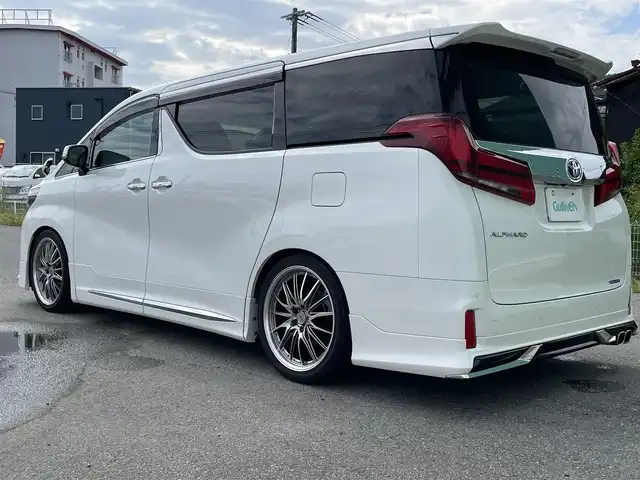 トヨタ アルファード S Cパッケージ 福岡県 2022(令4)年 1.6万km ホワイトパールクリスタルシャイン ワンオーナー/フリップダウンモニター/ツインムーンルーフ/モデリスタエアロ（F/S/R)/純正ナビ（BT/フルセグ/AM/FM/DISC/USB)/Bカメラ/パワーバックドア/オットマン/両側パワースライドドア/レーダークルーズコントロール/LEDヘッドライト/オートライト/オートマチックハイビーム/シーケンシャルターンランプ/レザーシート/シートメモリー/DN席パワーシート/DN席エアシート/DN席シートヒーター/ステアリングヒーター/チルトステアリング/純正20インチAW/ローダウン/BSM/クリアランスソナー/横滑り防止装置/レーンキープアシスト/盗難防止装置/衝突被害軽減ブレーキ/アイドリングストップ/ドライブレコーダー/デジタルインナーミラー/NANOE/スマートキー/ETC/保証書/取扱説明書