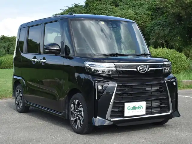 ダイハツ タント カスタム X 福岡県 2023(令5)年 0.8万km ブラックマイカメタリック 　タント　カスタムX　/純正ディスプレイオーディオ/　　フルセグTV/B・T　　/バックカメラ/両側パワースライドドア/前席シートヒーター/クリアランスソナー/LEDヘッドライト/純正14インチアルミホイール/ETC/保証書あり/取扱説明書あり/スペアキーあり