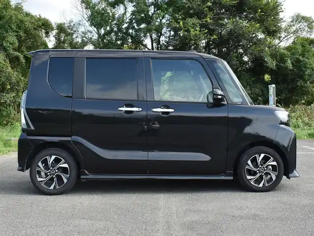 ダイハツ タント カスタム X 福岡県 2023(令5)年 0.8万km ブラックマイカメタリック 　タント　カスタムX　/純正ディスプレイオーディオ/　　フルセグTV/B・T　　/バックカメラ/両側パワースライドドア/前席シートヒーター/クリアランスソナー/LEDヘッドライト/純正14インチアルミホイール/ETC/保証書あり/取扱説明書あり/スペアキーあり