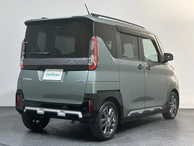 三菱 デリカミニ G プレミアム 愛媛県 2023(令5)年 0.7万km 緑 純正9インチナビ/(Bluetooth/CD/DVD/フルセグ)/全周囲カメラ/マイパイロット/デジタルルームミラー/衝突被害軽減ブレーキ/レーンキープアシスト/前後コーナーセンサー/ダウンヒルアシストコントロール/D/Nシートヒーター/ステアリングヒーター/両側電動スライドドア/ルーフレール/サイドサンシェード/リアサーキュレーター/LEDヘッドライト/オートマチックハイビーム/オートライト/ヘッドライトレベライザー/スペアキー/保証書/取扱説明書