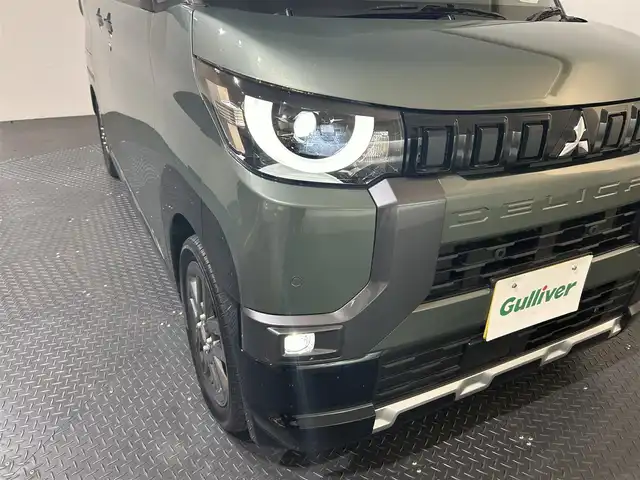 三菱 デリカミニ G プレミアム 愛媛県 2023(令5)年 0.7万km 緑 純正9インチナビ/(Bluetooth/CD/DVD/フルセグ)/全周囲カメラ/マイパイロット/デジタルルームミラー/衝突被害軽減ブレーキ/レーンキープアシスト/前後コーナーセンサー/ダウンヒルアシストコントロール/D/Nシートヒーター/ステアリングヒーター/両側電動スライドドア/ルーフレール/サイドサンシェード/リアサーキュレーター/LEDヘッドライト/オートマチックハイビーム/オートライト/ヘッドライトレベライザー/スペアキー/保証書/取扱説明書