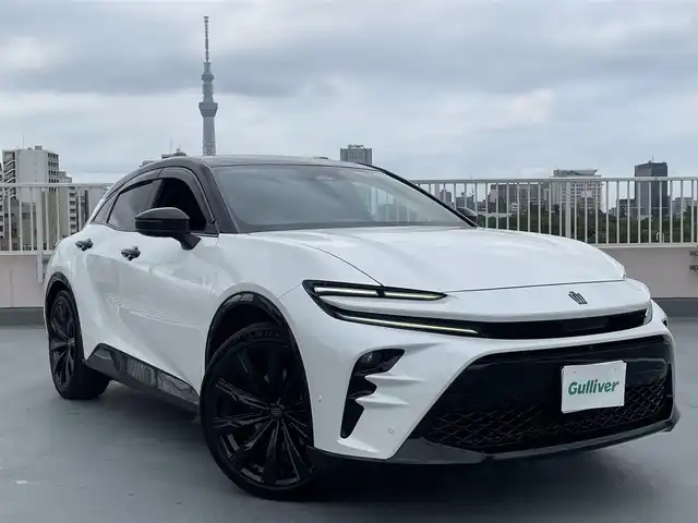 トヨタ クラウン スポーツ Z 東京都 2024(令6)年 0.7万km パールⅡ ワンオーナー/4WD /Toyota Safety Sense/　プリクラッシュセーフティシステム/　レーンディパーチャーアラート/　BSM・RCTA・RCD・PDA・PKSB・SEA・AVSP/   RSA・レーダークルーズコントロール/パーキングアシスト/オートライト/オートマチックハイビーム/オートワイパー/ワイヤレス充電/純正ナビ・BT/地デジTV/バックカメラ/全方位カメラ/黒革シート/シートヒーター/エアシート/パワーバックカメラ/メモリーパワーシート/純正２１インチアルミ/デジタルインナーミラー/ビルトインETC2.0/モデリスタドアハンドルプロテクター/マフラーカッター/スペアキー１本/保証書・取説