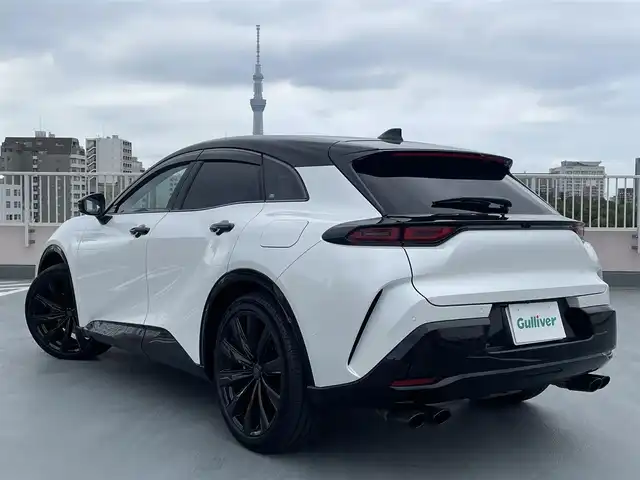 トヨタ クラウン スポーツ Z 東京都 2024(令6)年 0.7万km パールⅡ ワンオーナー/4WD /Toyota Safety Sense/　プリクラッシュセーフティシステム/　レーンディパーチャーアラート/　BSM・RCTA・RCD・PDA・PKSB・SEA・AVSP/   RSA・レーダークルーズコントロール/パーキングアシスト/オートライト/オートマチックハイビーム/オートワイパー/ワイヤレス充電/純正ナビ・BT/地デジTV/バックカメラ/全方位カメラ/黒革シート/シートヒーター/エアシート/パワーバックカメラ/メモリーパワーシート/純正２１インチアルミ/デジタルインナーミラー/ビルトインETC2.0/モデリスタドアハンドルプロテクター/マフラーカッター/スペアキー１本/保証書・取説