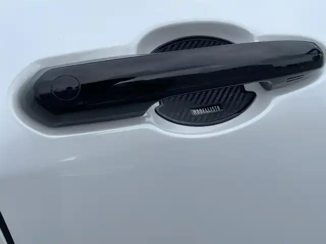 トヨタ クラウン スポーツ Z 東京都 2024(令6)年 0.7万km パールⅡ ワンオーナー/4WD /Toyota Safety Sense/　プリクラッシュセーフティシステム/　レーンディパーチャーアラート/　BSM・RCTA・RCD・PDA・PKSB・SEA・AVSP/   RSA・レーダークルーズコントロール/パーキングアシスト/オートライト/オートマチックハイビーム/オートワイパー/ワイヤレス充電/純正ナビ・BT/地デジTV/バックカメラ/全方位カメラ/黒革シート/シートヒーター/エアシート/パワーバックカメラ/メモリーパワーシート/純正２１インチアルミ/デジタルインナーミラー/ビルトインETC2.0/モデリスタドアハンドルプロテクター/マフラーカッター/スペアキー１本/保証書・取説
