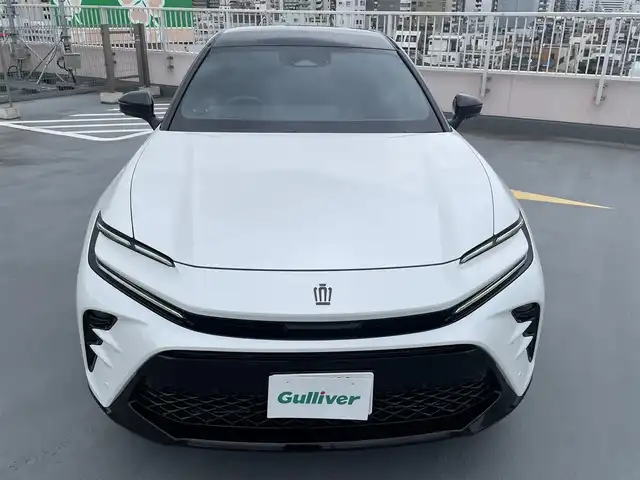 トヨタ クラウン スポーツ Z 東京都 2024(令6)年 0.7万km パールⅡ ワンオーナー/4WD /Toyota Safety Sense/　プリクラッシュセーフティシステム/　レーンディパーチャーアラート/　BSM・RCTA・RCD・PDA・PKSB・SEA・AVSP/   RSA・レーダークルーズコントロール/パーキングアシスト/オートライト/オートマチックハイビーム/オートワイパー/ワイヤレス充電/純正ナビ・BT/地デジTV/バックカメラ/全方位カメラ/黒革シート/シートヒーター/エアシート/パワーバックカメラ/メモリーパワーシート/純正２１インチアルミ/デジタルインナーミラー/ビルトインETC2.0/モデリスタドアハンドルプロテクター/マフラーカッター/スペアキー１本/保証書・取説