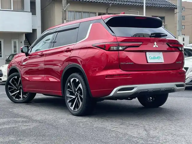 三菱 アウトランダー ＰＨＥＶ P 島根県 2021(令3)年 2.4万km レッドダイヤモンド 4WD/純正12型メモリナビ/フルセグＴＶ/BT/アラウンドビューモニター/（全周囲・前方・後方・サイド）/マイパイロット　/・レーダークルーズコントロール　/・レーンキープアシスト/・衝突軽減システム　/・前後コーナーセンサー/BOSEスピーカー/ハーフレザーシート　/全席シートヒーター/前席パワーシート/ハンドルヒーター/パワーバックドア/ETC/純正LEDライト/純正20インチアルミホイール/充電ケーブルあり