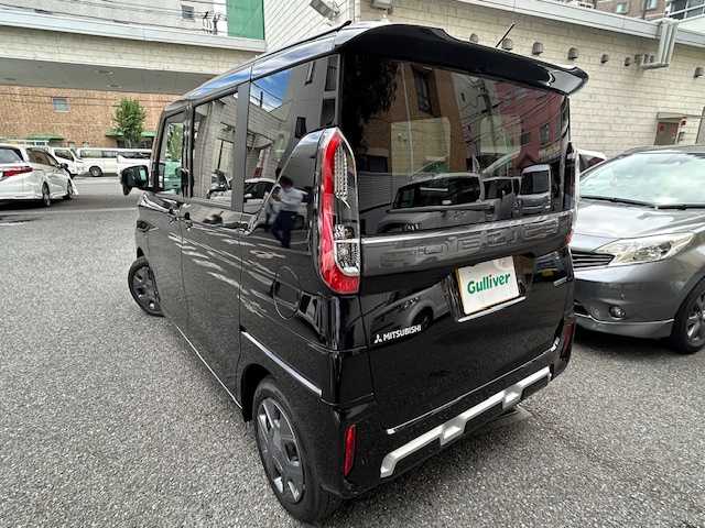 三菱 デリカミニ G 東京都 2024(令6)年 0.1万km未満 アメジストブラック 登録時走行72km/e-アシスト（運転支援機能）/・衝突被害軽減ブレーキシステム/・前方衝突予測警報/・踏み間違い衝突防止アシスト/・標識検知システム/・車線逸脱警報システム/・車線逸脱防止支援機能/・先行車発進通知/・オートマチックハイビーム/・ふらつき警報/前席シートヒーター/ルーフレール/バックカメラ/ハンズフリーパワースライドドア/ハーフレザーシート（合皮）/LEDライト/スマートキー/オートエアコン/保証書・取説/スペアキー