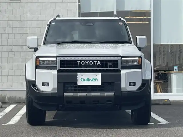 トヨタ ランドクルーザー ２５０ VX 宮崎県 2024(令6)年 0.2万km プラチナホワイトパールマイカ 純正ナビ/フルセグTV/バックカメラ/全方位カメラ/ステアリングスイッチ/レーダークルーズコントロール/横滑り防止機能/パワーバックドア /ブラックレザーシート/サンルーフ/D席/N席シートヒーター/D席/ N席シートクーラー/ステアリングヒーター/デジタルインナーミラー/ブラインドスポットモニタ/ビルトインETC