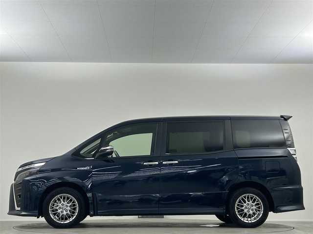 トヨタ ヴォクシー ハイブリッド ZS 煌Ⅱ 埼玉県 2019(令1)年 3.8万km ブラッキッシュアゲハガラスフレーク 純正９インチナビＴＶ　後席フリップダウンモニター　両側パワースライドドア　クルーズコントロール　ビルトインＥＴＣ　ＬＥＤヘッド　ＬＥＤフォグ　シートヒーター　ドライブレコーダー　専用ＢＢＳホイル