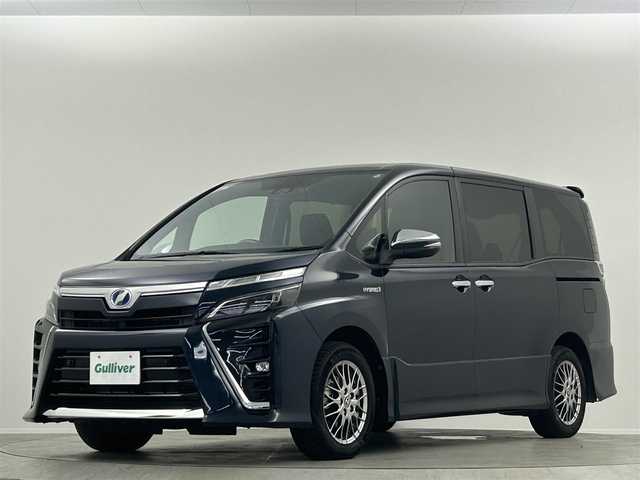 トヨタ ヴォクシー ハイブリッド ZS 煌Ⅱ 埼玉県 2019(令1)年 3.8万km ブラッキッシュアゲハガラスフレーク 純正９インチナビＴＶ　後席フリップダウンモニター　両側パワースライドドア　クルーズコントロール　ビルトインＥＴＣ　ＬＥＤヘッド　ＬＥＤフォグ　シートヒーター　ドライブレコーダー　専用ＢＢＳホイル