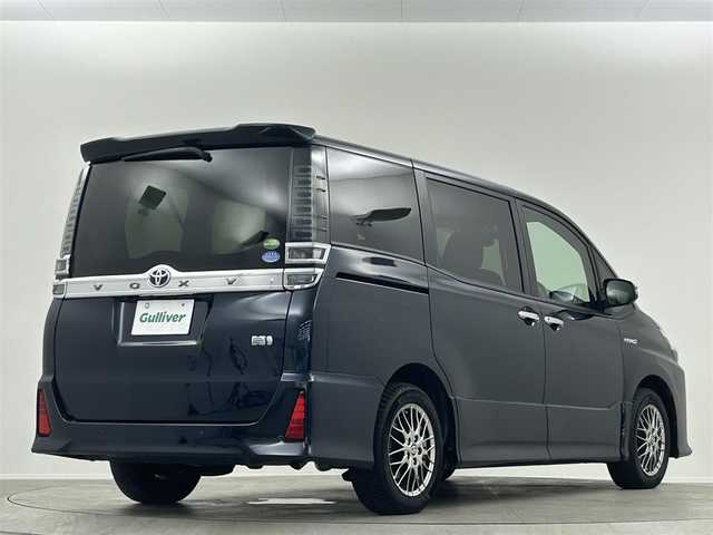 トヨタ ヴォクシー ハイブリッド ZS 煌Ⅱ 埼玉県 2019(令1)年 3.8万km ブラッキッシュアゲハガラスフレーク 純正９インチナビＴＶ　後席フリップダウンモニター　両側パワースライドドア　クルーズコントロール　ビルトインＥＴＣ　ＬＥＤヘッド　ＬＥＤフォグ　シートヒーター　ドライブレコーダー　専用ＢＢＳホイル