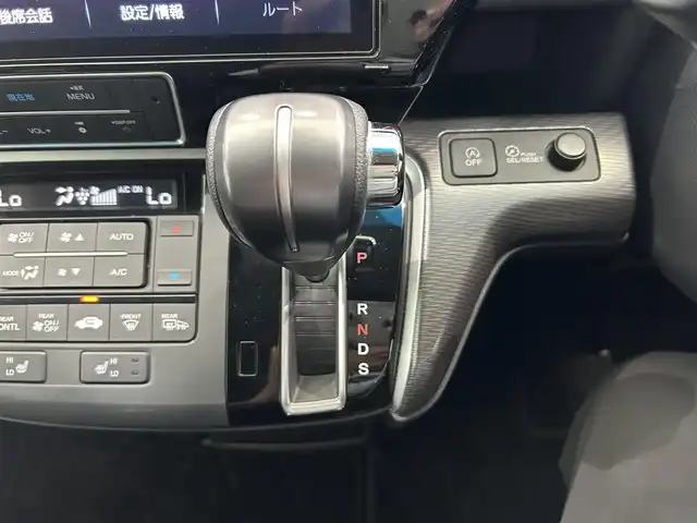 ホンダ ステップワゴン スパーダ クルスピセンシング 鹿児島県 2021(令3)年 1.8万km プレミアムスパークルブラックパール 純正ナビ【ＶＸＵ－２０７ＳＷｉ】　/バックカメラ　/ホンダセンシング　/純正フリップダウンモニター　/革巻きステアリング　/パドルシフト　/ステアリングリモコン　/電動格納ミラー　/サンシェード　/ＥＴＣ　/禁煙車