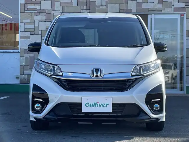 ホンダ フリード ハイブリット モデューロX ホンダセンシング 徳島県 2021(令3)年 3.4万km プラチナホワイトパール 純正9インチナビ/（Bluetooth/フルセグTV/CD/DVD/ラジオ/HDMI/USB）/バックカメラ/両側パワースライドドア/追従式クルーズコントロール/LEDヘッドライト/フォグライト/オートライト/純正15AW/純正フロアマット/ドアバイザー/電格ミラー/プッシュスタート/スマートキー/取扱説明書/保証書/記録簿