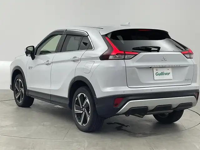 三菱 エクリプス クロス ＰＨＥＶ G 愛知県 2021(令3)年 2.6万km ホワイトダイヤモンド 純正7インチナビ/・Bluetooth/フルセグ/CD/DVD/USB/バックカメラ/e-アシスト(衝突回避支援パッケージ)/・衝突被害軽減ブレーキシステム/・車線逸脱警報システム/・レーダークルーズコントロール/・オートマチックハイビーム/・誤発進抑制機能/・後側方/後退時車両検知警報システム/電動パーキングブレーキ/ブレーキオートホールド/ヘッドアップディスプレイ/運転席パワーシート/前席シートヒーター/ステアリングヒーター/AC1500W電源/LEDヘッドランプ/LEDフォグランプ/パドルシフト/前後ドライブレコーダー