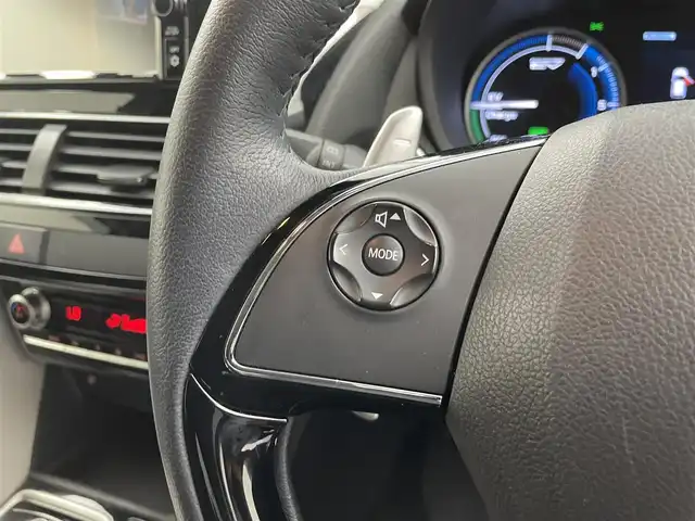 三菱 エクリプス クロス ＰＨＥＶ G 愛知県 2021(令3)年 2.6万km ホワイトダイヤモンド 純正7インチナビ/・Bluetooth/フルセグ/CD/DVD/USB/バックカメラ/e-アシスト(衝突回避支援パッケージ)/・衝突被害軽減ブレーキシステム/・車線逸脱警報システム/・レーダークルーズコントロール/・オートマチックハイビーム/・誤発進抑制機能/・後側方/後退時車両検知警報システム/電動パーキングブレーキ/ブレーキオートホールド/ヘッドアップディスプレイ/運転席パワーシート/前席シートヒーター/ステアリングヒーター/AC1500W電源/LEDヘッドランプ/LEDフォグランプ/パドルシフト/前後ドライブレコーダー