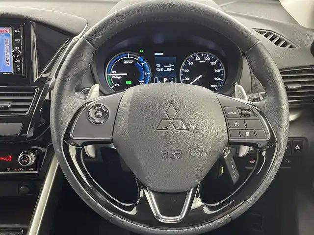 三菱 エクリプス クロス ＰＨＥＶ G 愛知県 2021(令3)年 2.6万km ホワイトダイヤモンド 純正7インチナビ/・Bluetooth/フルセグ/CD/DVD/USB/バックカメラ/e-アシスト(衝突回避支援パッケージ)/・衝突被害軽減ブレーキシステム/・車線逸脱警報システム/・レーダークルーズコントロール/・オートマチックハイビーム/・誤発進抑制機能/・後側方/後退時車両検知警報システム/電動パーキングブレーキ/ブレーキオートホールド/ヘッドアップディスプレイ/運転席パワーシート/前席シートヒーター/ステアリングヒーター/AC1500W電源/LEDヘッドランプ/LEDフォグランプ/パドルシフト/前後ドライブレコーダー