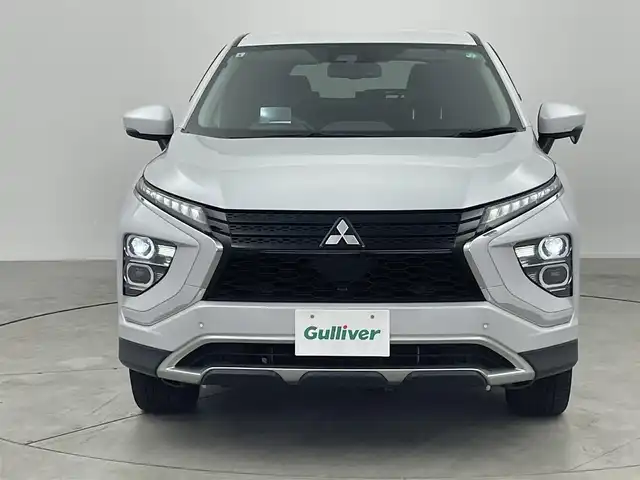三菱 エクリプス クロス ＰＨＥＶ G 愛知県 2021(令3)年 2.6万km ホワイトダイヤモンド 純正7インチナビ/・Bluetooth/フルセグ/CD/DVD/USB/バックカメラ/e-アシスト(衝突回避支援パッケージ)/・衝突被害軽減ブレーキシステム/・車線逸脱警報システム/・レーダークルーズコントロール/・オートマチックハイビーム/・誤発進抑制機能/・後側方/後退時車両検知警報システム/電動パーキングブレーキ/ブレーキオートホールド/ヘッドアップディスプレイ/運転席パワーシート/前席シートヒーター/ステアリングヒーター/AC1500W電源/LEDヘッドランプ/LEDフォグランプ/パドルシフト/前後ドライブレコーダー