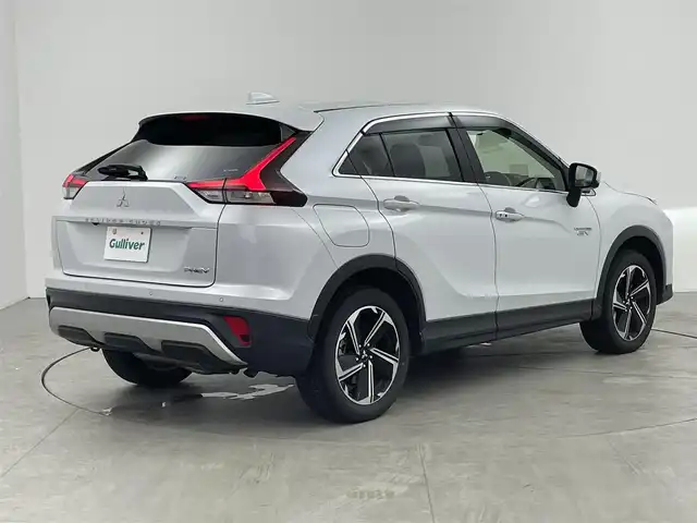 三菱 エクリプス クロス ＰＨＥＶ G 愛知県 2021(令3)年 2.6万km ホワイトダイヤモンド 純正7インチナビ/・Bluetooth/フルセグ/CD/DVD/USB/バックカメラ/e-アシスト(衝突回避支援パッケージ)/・衝突被害軽減ブレーキシステム/・車線逸脱警報システム/・レーダークルーズコントロール/・オートマチックハイビーム/・誤発進抑制機能/・後側方/後退時車両検知警報システム/電動パーキングブレーキ/ブレーキオートホールド/ヘッドアップディスプレイ/運転席パワーシート/前席シートヒーター/ステアリングヒーター/AC1500W電源/LEDヘッドランプ/LEDフォグランプ/パドルシフト/前後ドライブレコーダー