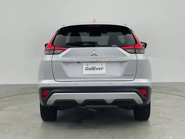 三菱 エクリプス クロス ＰＨＥＶ G 愛知県 2021(令3)年 2.6万km ホワイトダイヤモンド 純正7インチナビ/・Bluetooth/フルセグ/CD/DVD/USB/バックカメラ/e-アシスト(衝突回避支援パッケージ)/・衝突被害軽減ブレーキシステム/・車線逸脱警報システム/・レーダークルーズコントロール/・オートマチックハイビーム/・誤発進抑制機能/・後側方/後退時車両検知警報システム/電動パーキングブレーキ/ブレーキオートホールド/ヘッドアップディスプレイ/運転席パワーシート/前席シートヒーター/ステアリングヒーター/AC1500W電源/LEDヘッドランプ/LEDフォグランプ/パドルシフト/前後ドライブレコーダー