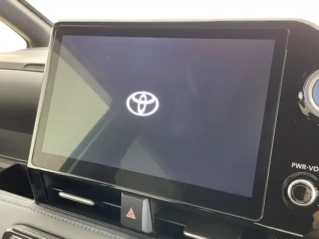 トヨタ ヴォクシー ハイブリッド S－Z 新潟県 2023(令5)年 2.3万km ホワイトパールクリスタルシャイン 純正10.5インチナビ/（BT/FM/AM/フルセグTV）/バックカメラ/ステアリングスイッチ/D/N席シートヒーター/AC100V/ハーフレザーシート/純正LEDオートヘッドライト/サンシェード/ウィンカーミラー/ヘッドライトレベライザー/ドアバイザー/ETC2.0/取扱説明書