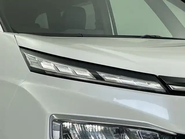 トヨタ ヴォクシー ハイブリッド S－Z 新潟県 2023(令5)年 2.3万km ホワイトパールクリスタルシャイン 純正10.5インチナビ/（BT/FM/AM/フルセグTV）/バックカメラ/ステアリングスイッチ/D/N席シートヒーター/AC100V/ハーフレザーシート/純正LEDオートヘッドライト/サンシェード/ウィンカーミラー/ヘッドライトレベライザー/ドアバイザー/ETC2.0/取扱説明書