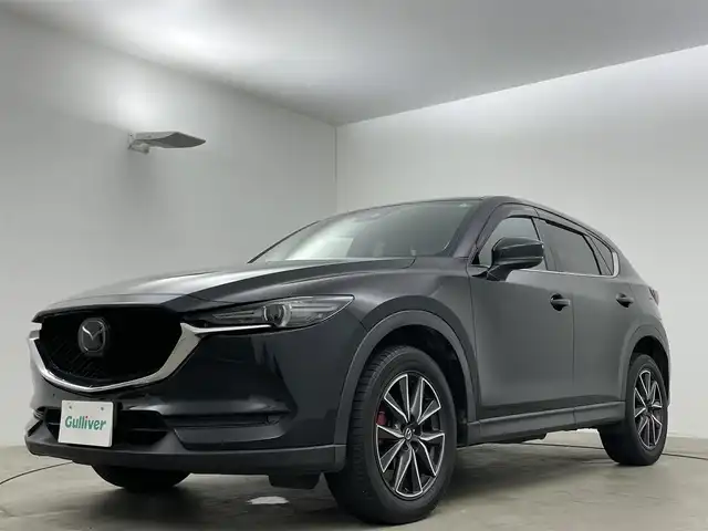 マツダ ＣＸ－５ XD Lパッケージ 岡山県 2017(平29)年 9万km ジェットブラックマイカ 純正メモリナビゲーション		/【フルセグ/Bluetooth/DVD】		/バックカメラ		/純正19inアルミホイール+サマータイヤ：装着		/レーダークルーズコントロール		/ビルトインETC		/LEDヘッドライト（AUTO機能付き）		/シートヒーター	/ステアリングヒーター/パワーバックドア/パワーシート	/横滑り防止機能		/衝突軽減システム		/車線逸脱防止システム				/スマートキー		/ステアリングスイッチ		/プッシュスタート		/コーナーセンサー		/フロアマット