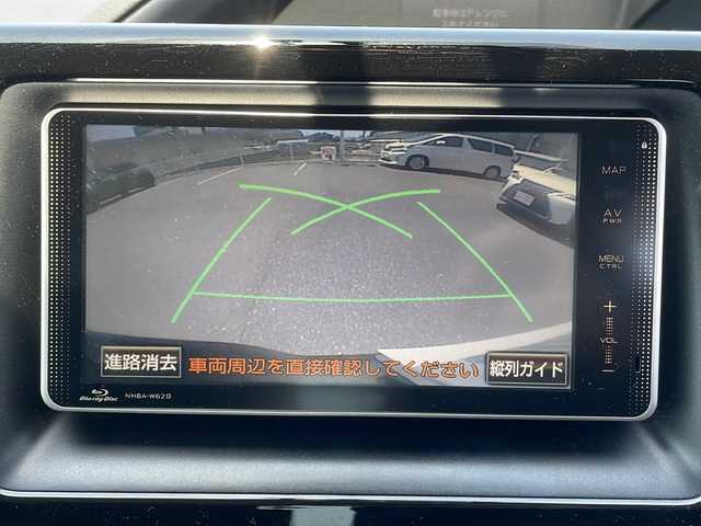 トヨタ ヴォクシー ハイブリッド V 山口県 2014(平26)年 11.1万km ダークバイオレットマイカメタリック ワンオーナー/純正HDDナビ/(CD/DVD/Bluetooth/フルセグTV/ブルーレイ)/バックカメラ/ETC/両側パワースライドドア/クルーズコントロール/オートライト/フォグランプ/プッシュスタート/スマートキー×２/ステアリングスイッチ/純正フロアマット/社外アルミホイール/後席サンシェード/取扱説明書/保証書/記録簿