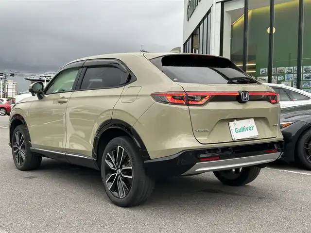 ホンダ ヴェゼル ハイブリッド 長崎県 2021(令3)年 3.9万km ベージュ 純正ナビ/Bluetooth/AM・FM/フルセグテレビ/USB/アダプティブクルーズコントロール/ドラレコ/パワーバックドア/LEDヘッドライト/ホンダセンシング/置くだけ充電/コーナーセンサー/ステアリングヒーター/シートヒーター/衝突被害軽減システム/ETC