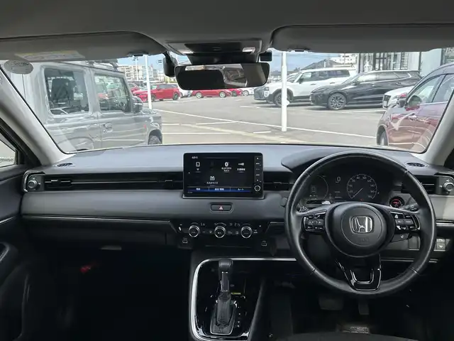 ホンダ ヴェゼル ハイブリッド 長崎県 2021(令3)年 3.9万km ベージュ 純正ナビ/Bluetooth/AM・FM/フルセグテレビ/USB/アダプティブクルーズコントロール/ドラレコ/パワーバックドア/LEDヘッドライト/ホンダセンシング/置くだけ充電/コーナーセンサー/ステアリングヒーター/シートヒーター/衝突被害軽減システム/ETC