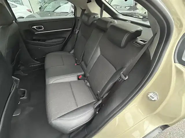 ホンダ ヴェゼル ハイブリッド 長崎県 2021(令3)年 3.9万km ベージュ 純正ナビ/Bluetooth/AM・FM/フルセグテレビ/USB/アダプティブクルーズコントロール/ドラレコ/パワーバックドア/LEDヘッドライト/ホンダセンシング/置くだけ充電/コーナーセンサー/ステアリングヒーター/シートヒーター/衝突被害軽減システム/ETC