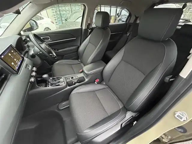 ホンダ ヴェゼル ハイブリッド 長崎県 2021(令3)年 3.9万km ベージュ 純正ナビ/Bluetooth/AM・FM/フルセグテレビ/USB/アダプティブクルーズコントロール/ドラレコ/パワーバックドア/LEDヘッドライト/ホンダセンシング/置くだけ充電/コーナーセンサー/ステアリングヒーター/シートヒーター/衝突被害軽減システム/ETC