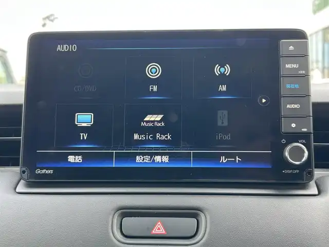 ホンダ ヴェゼル ハイブリッド 長崎県 2021(令3)年 3.9万km ベージュ 純正ナビ/Bluetooth/AM・FM/フルセグテレビ/USB/アダプティブクルーズコントロール/ドラレコ/パワーバックドア/LEDヘッドライト/ホンダセンシング/置くだけ充電/コーナーセンサー/ステアリングヒーター/シートヒーター/衝突被害軽減システム/ETC