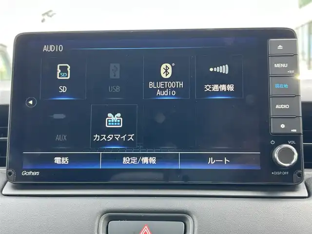 ホンダ ヴェゼル ハイブリッド 長崎県 2021(令3)年 3.9万km ベージュ 純正ナビ/Bluetooth/AM・FM/フルセグテレビ/USB/アダプティブクルーズコントロール/ドラレコ/パワーバックドア/LEDヘッドライト/ホンダセンシング/置くだけ充電/コーナーセンサー/ステアリングヒーター/シートヒーター/衝突被害軽減システム/ETC