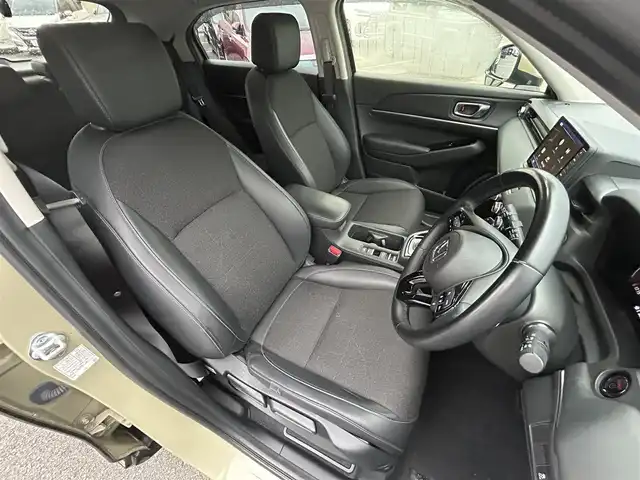 ホンダ ヴェゼル ハイブリッド 長崎県 2021(令3)年 3.9万km ベージュ 純正ナビ/Bluetooth/AM・FM/フルセグテレビ/USB/アダプティブクルーズコントロール/ドラレコ/パワーバックドア/LEDヘッドライト/ホンダセンシング/置くだけ充電/コーナーセンサー/ステアリングヒーター/シートヒーター/衝突被害軽減システム/ETC