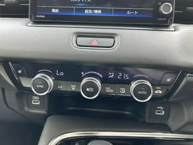 ホンダ ヴェゼル ハイブリッド 長崎県 2021(令3)年 3.9万km ベージュ 純正ナビ/Bluetooth/AM・FM/フルセグテレビ/USB/アダプティブクルーズコントロール/ドラレコ/パワーバックドア/LEDヘッドライト/ホンダセンシング/置くだけ充電/コーナーセンサー/ステアリングヒーター/シートヒーター/衝突被害軽減システム/ETC