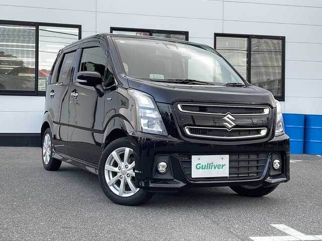 スズキ ワゴンＲ スティングレー HYBRID X 山口県 2019(令1)年 3.4万km ブルーイッシュブラックパール3 社外SDナビ/【KENWOOD：MDV-D708BTW】/・Bluetoothオーディオ/・ハンズフリー通話/・CD/DVD再生/・フルセグＴＶ/・AM/FMラジオ/・SDカード音楽録音/・SDカード再生/・USBデータ通信(ケーブル欠)/エネチャージ/エコクール/フルオートAC/バックカメラ/前後ドライブレコーダー/ETC/革巻チルトステアリング/ステアリングリモコン/アイドリングSTOP/リアコーナーセンサー/運転席シートヒーター/純正LEDヘッドライト/オートライト/フォグランプ/バニティミラー/衝突軽減ブレーキ/レーンキープアシスト/ヘッドアップディスプレイ/トラクションコントロール/電動格納ドアミラー/LEDミラーウィンカー/UVカットプライバシーガラス/リアシート分割スライド/後席ダイブダウンシート/後席ISOFIXシート/後席アンブレラホルダー/助手席シートアンダートレイ/純正14インチAW/スマートキー/プッシュスタート/イモビライザー/取扱説明書/メンテナンスノート/スペアキー