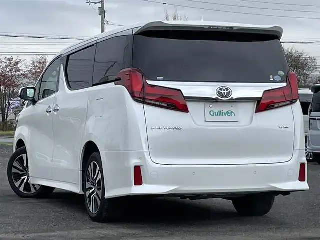 トヨタ アルファード SC 道央・札幌 2019(令1)年 3.1万km ホワイトパールクリスタルシャイン ４WD/ワンオーナー/社外メモリーナビ/CD/DVD/BT/フルセグ/社外フリップダウンモニター/トヨタセーフティセンス/プリクラッシュセーフティ/横滑り防止装置/レーダークルーズコントロール/レーンキープアシスト/クリアランスソナー/パーキングサポートブレーキ/ロードサインアシスト/バックカメラ/ビルトインETC/ドライブレコーダー/アイドリングストップ/ECOMODE/両側パワースライドドア/パワーバックドア/前席/２列目パワーシート/前席/２列目シートヒーター/前席エアシート/N席/２列目オットマン/レザーシート/革巻きウッドコンビステアリング/ステアリングリモコン/AC100V/自動防眩ミラー/電動パーキング/ブレーキホールド/MTモード付AT/プッシュスタート/スマートキー/LEDヘッドライト/オートライト/オートハイビーム/フォグランプ/電動格納ミラー/ウィンカーミラー/純正フロアマット