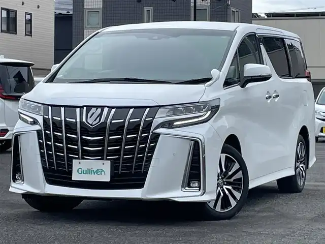 トヨタ アルファード SC 道央・札幌 2019(令1)年 3.1万km ホワイトパールクリスタルシャイン ４WD/ワンオーナー/社外メモリーナビ/CD/DVD/BT/フルセグ/社外フリップダウンモニター/トヨタセーフティセンス/プリクラッシュセーフティ/横滑り防止装置/レーダークルーズコントロール/レーンキープアシスト/クリアランスソナー/パーキングサポートブレーキ/ロードサインアシスト/バックカメラ/ビルトインETC/ドライブレコーダー/アイドリングストップ/ECOMODE/両側パワースライドドア/パワーバックドア/前席/２列目パワーシート/前席/２列目シートヒーター/前席エアシート/N席/２列目オットマン/レザーシート/革巻きウッドコンビステアリング/ステアリングリモコン/AC100V/自動防眩ミラー/電動パーキング/ブレーキホールド/MTモード付AT/プッシュスタート/スマートキー/LEDヘッドライト/オートライト/オートハイビーム/フォグランプ/電動格納ミラー/ウィンカーミラー/純正フロアマット