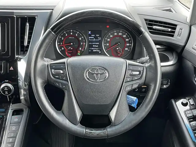 トヨタ アルファード SC 道央・札幌 2019(令1)年 3.1万km ホワイトパールクリスタルシャイン ４WD/ワンオーナー/社外メモリーナビ/CD/DVD/BT/フルセグ/社外フリップダウンモニター/トヨタセーフティセンス/プリクラッシュセーフティ/横滑り防止装置/レーダークルーズコントロール/レーンキープアシスト/クリアランスソナー/パーキングサポートブレーキ/ロードサインアシスト/バックカメラ/ビルトインETC/ドライブレコーダー/アイドリングストップ/ECOMODE/両側パワースライドドア/パワーバックドア/前席/２列目パワーシート/前席/２列目シートヒーター/前席エアシート/N席/２列目オットマン/レザーシート/革巻きウッドコンビステアリング/ステアリングリモコン/AC100V/自動防眩ミラー/電動パーキング/ブレーキホールド/MTモード付AT/プッシュスタート/スマートキー/LEDヘッドライト/オートライト/オートハイビーム/フォグランプ/電動格納ミラー/ウィンカーミラー/純正フロアマット