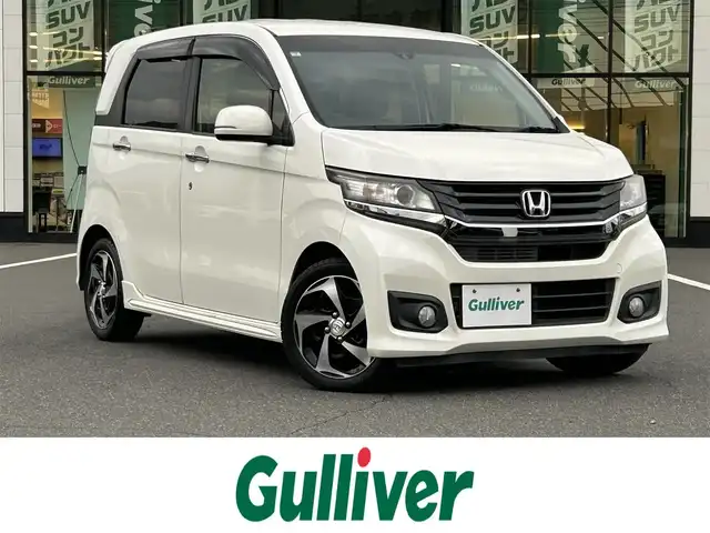 ホンダ Ｎ ＷＧＮ カスタム G ターボパッケージ 岡山県 2015(平27)年 8.1万km プレミアムホワイトパール ターボ　/社外ナビ　/(AM.FM.CD.DVD.TV.BT)/バックカメラ　/クルーズコントロール　/ＥＴＣ　/シティブレーキアクティブシステム/MTモード付AT/ハーフレザーシート　/オートライト　/AAC　/Bluetooth接続　/15インチ純正AW　/純正フロアマット　/横滑り防止装置