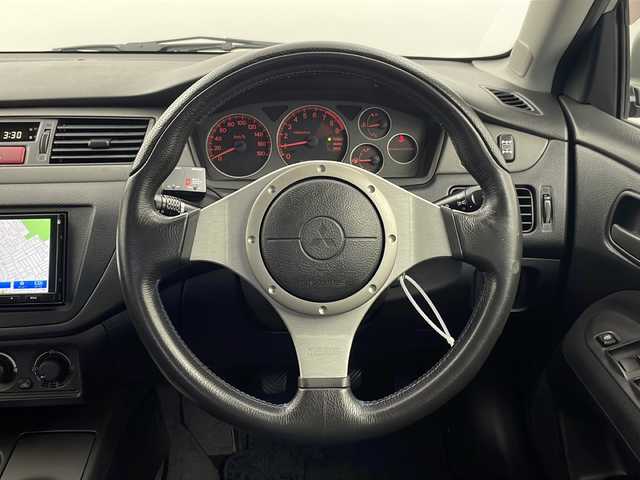 三菱 ランサー GSR エボリューションⅦ 栃木県 2001(平13)年 7.1万km サテライトシルバー 社外７インチナビ/（DVD/CD/AM・FM/BT)/ドライブレコーダー/電動格納ミラー/4WD/５速MT/センターデフロック/純正レカロシート/革巻きステアリング/革巻きシフトレバー/フォグライト/純正１７インチAW/オートエアコン/ドアバイザー/ターボタイマー/スペアキー２本/新車時保証書/取扱説明書
